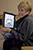 PMUG's Maria Arguello, Apple Northeast User Group Laison, with her iPad before the May 2010 meeting.